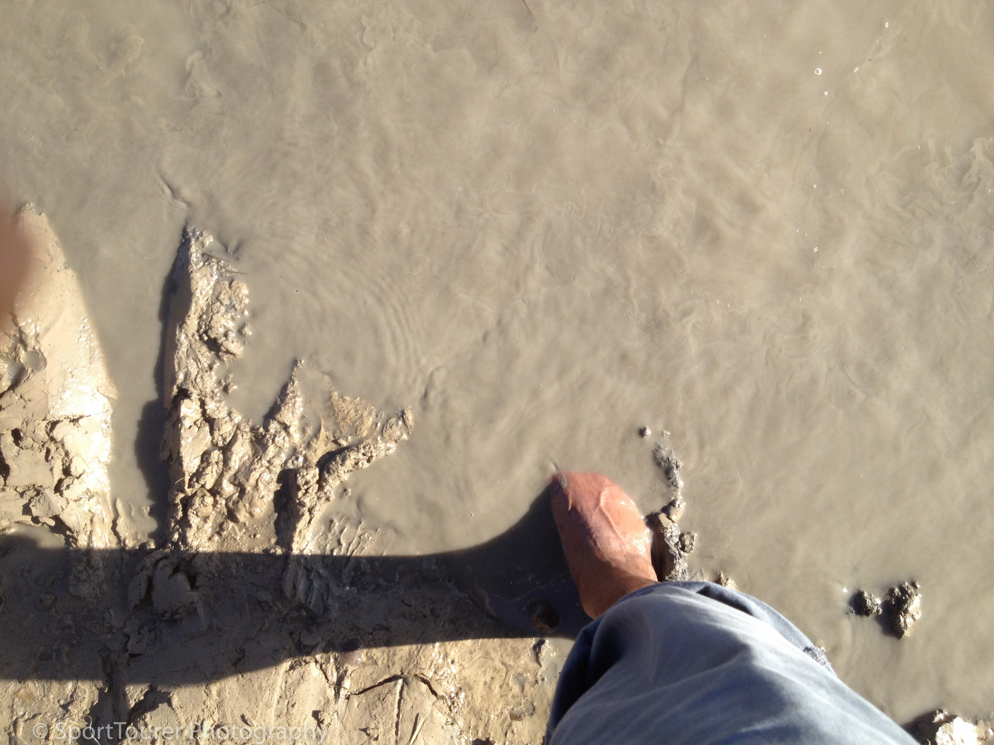  ............... squishing mud between my toes. Oh how good it felt. Took my mind way back to Africa, growing up as a little boy, playing in the rain water and mud after a monsoon rainfall. 