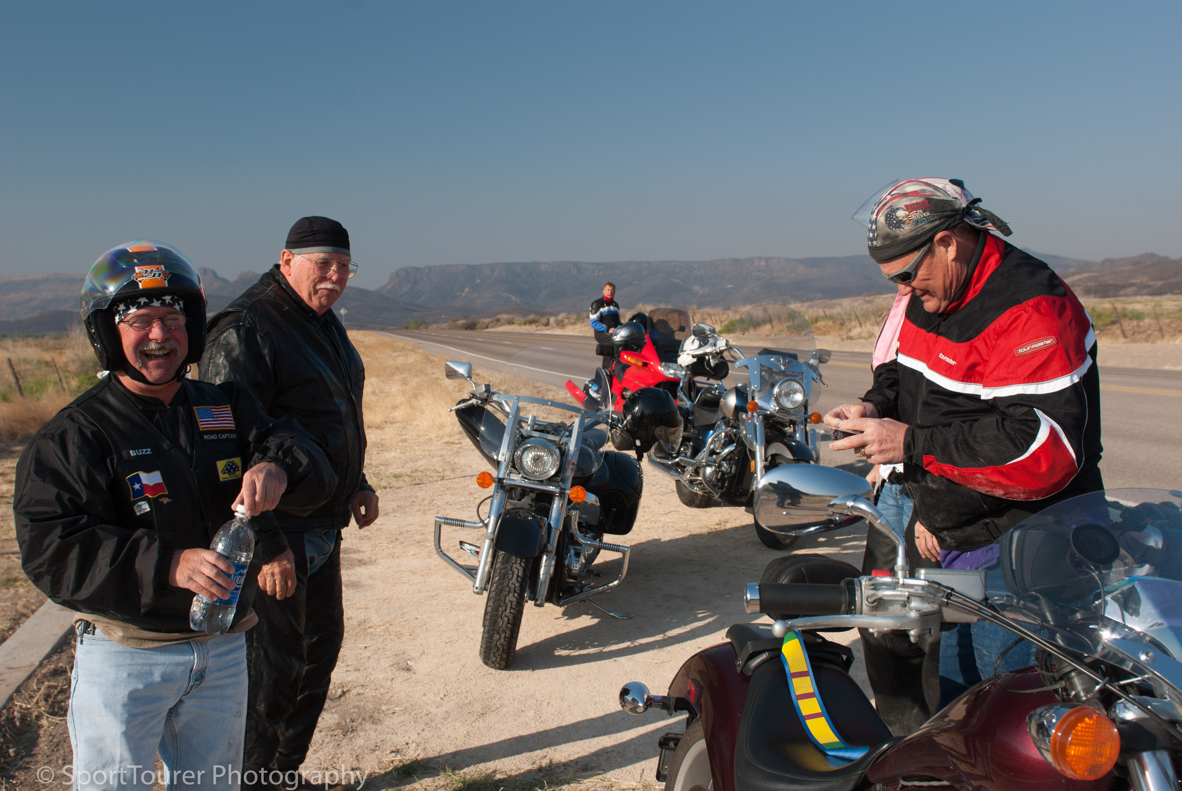  Preparing to patch a flat rear tire as we motored through the Fort Davis Mountain Range. 