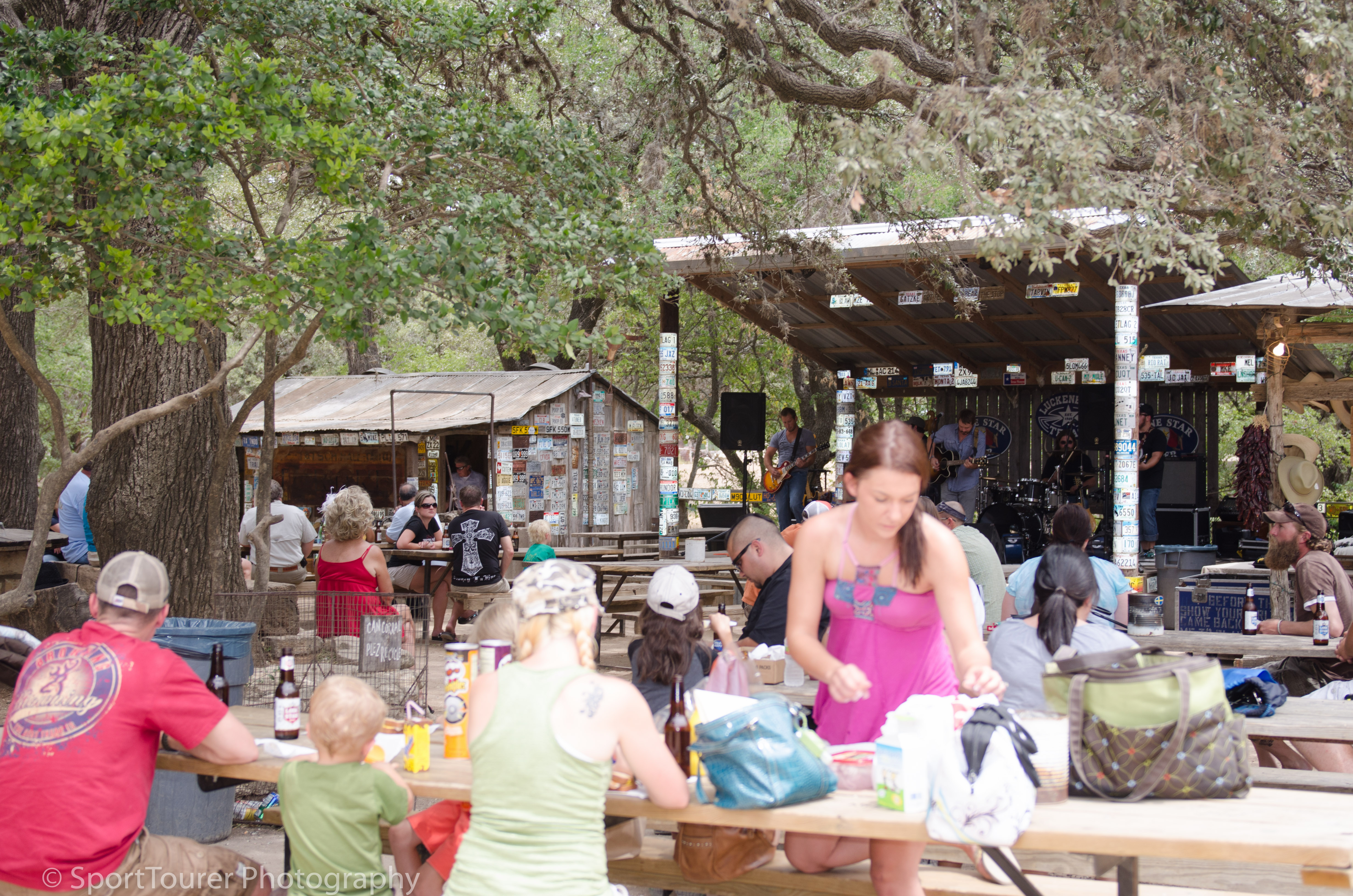  Townsfolk gathering behind the Post Office/Town Center for an afternoon of country music and socializing. 