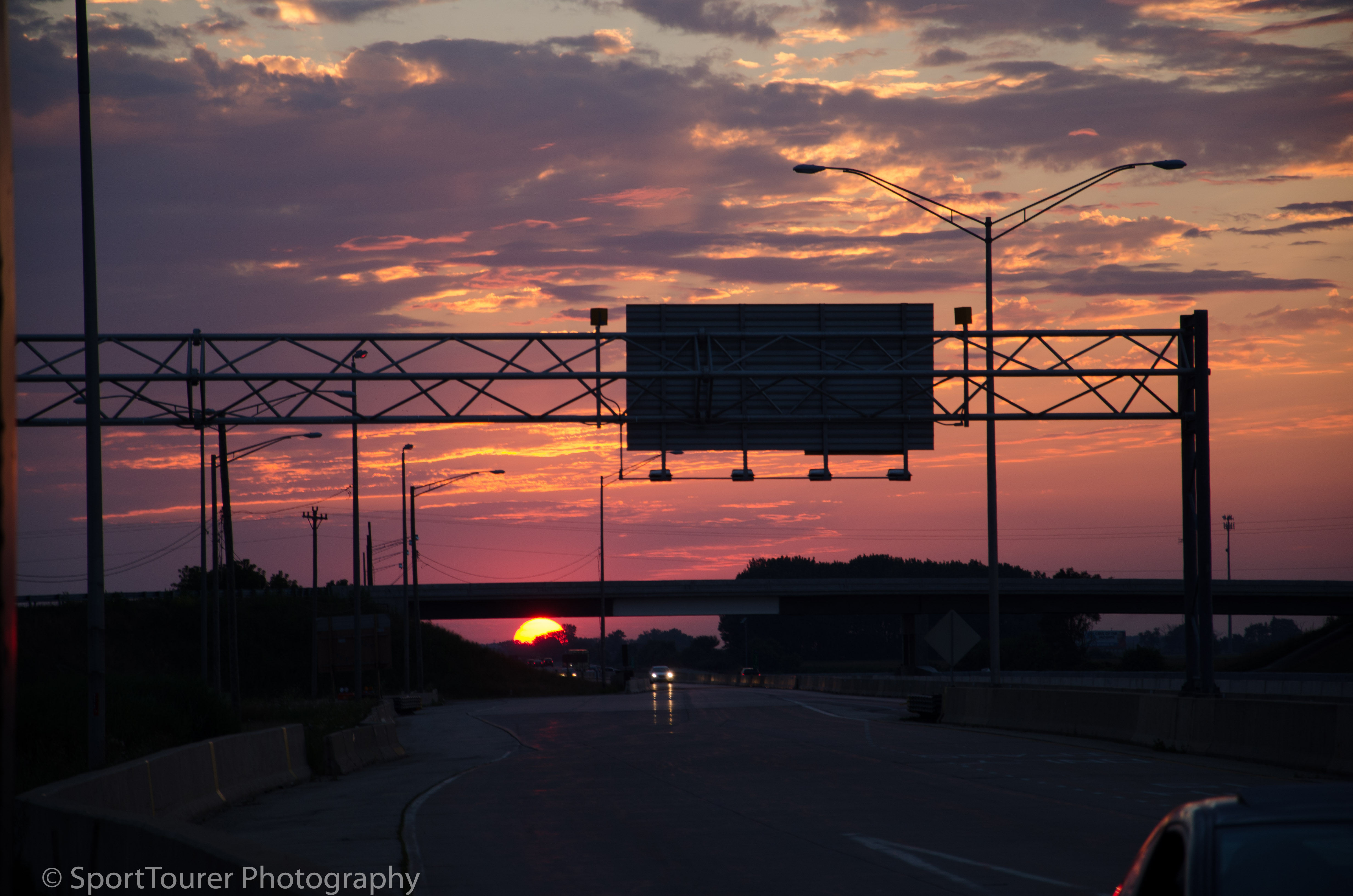  Arriving in Illinois at sundown, signalling a return to urban sprawl. 