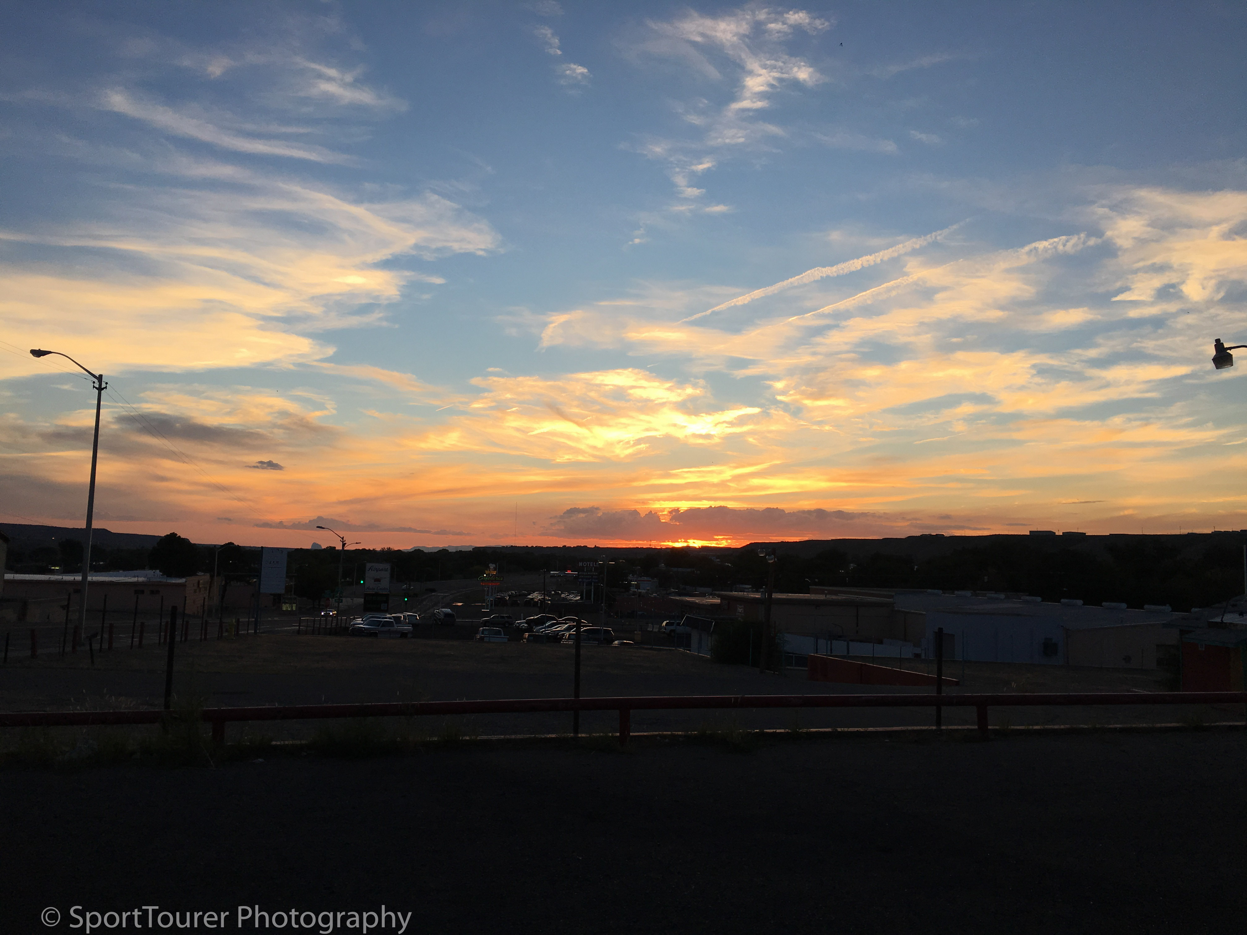  End of my riding day in Farmington, NM as the sun dipped below the mountains off in the distance 