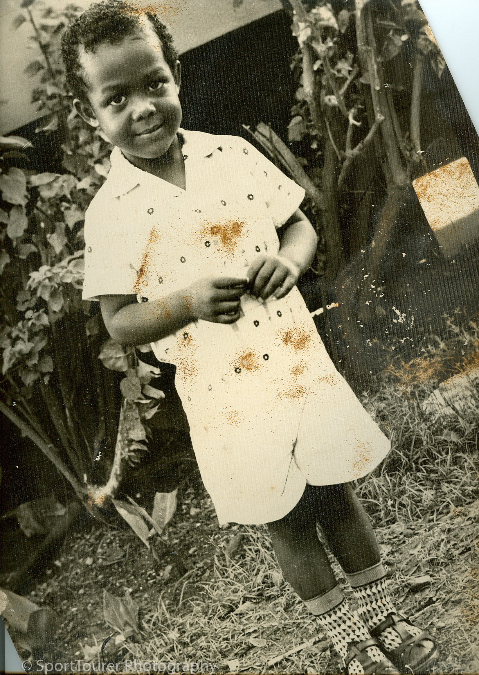  My first day of primary school, which happened to also be my first day ever on a motorcycle. Dang, I looked sharp and ready ............... to ride! 