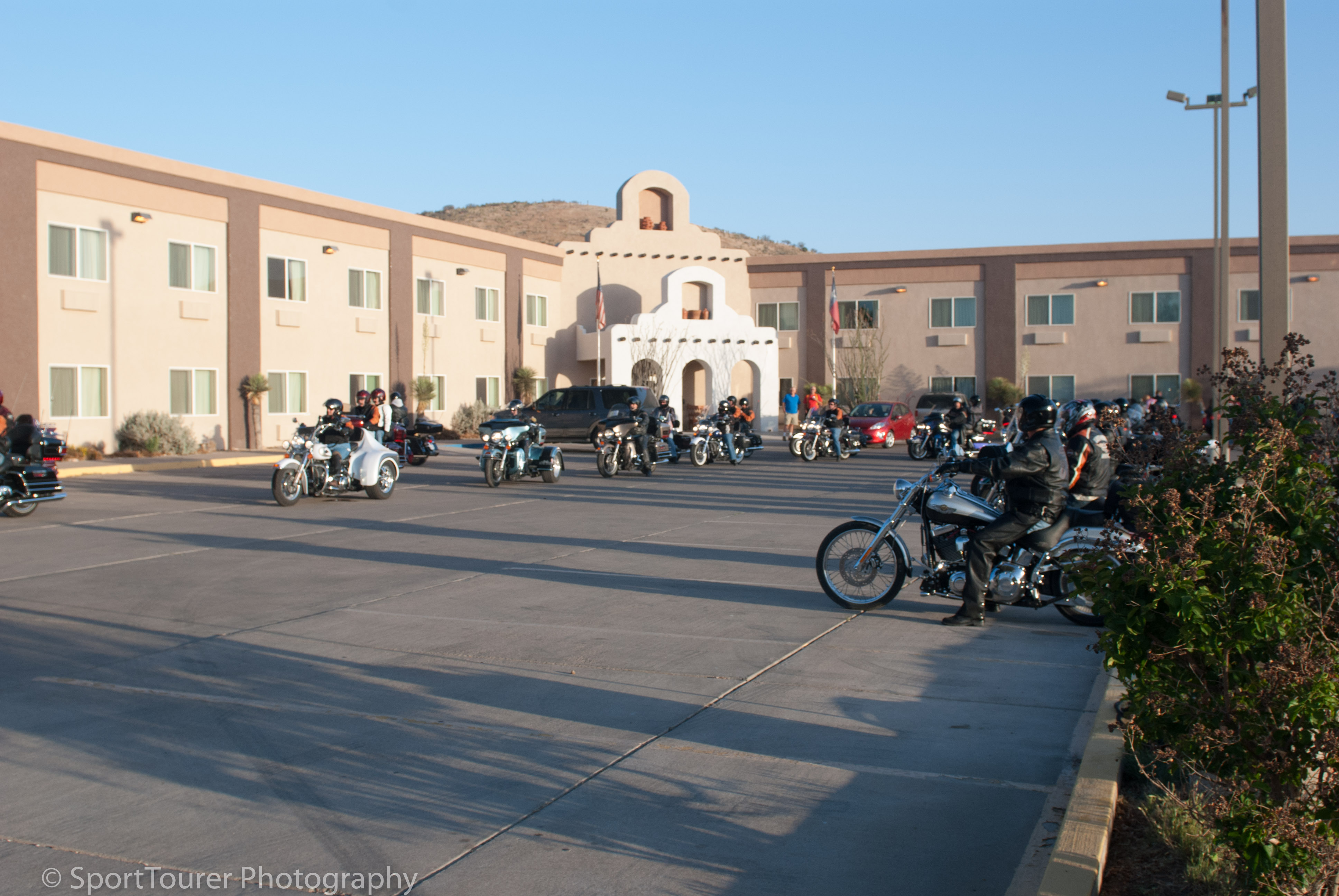  Group of other bikers leaving the hotel parking lot in Alpine, Texas on a lovely April morning. 