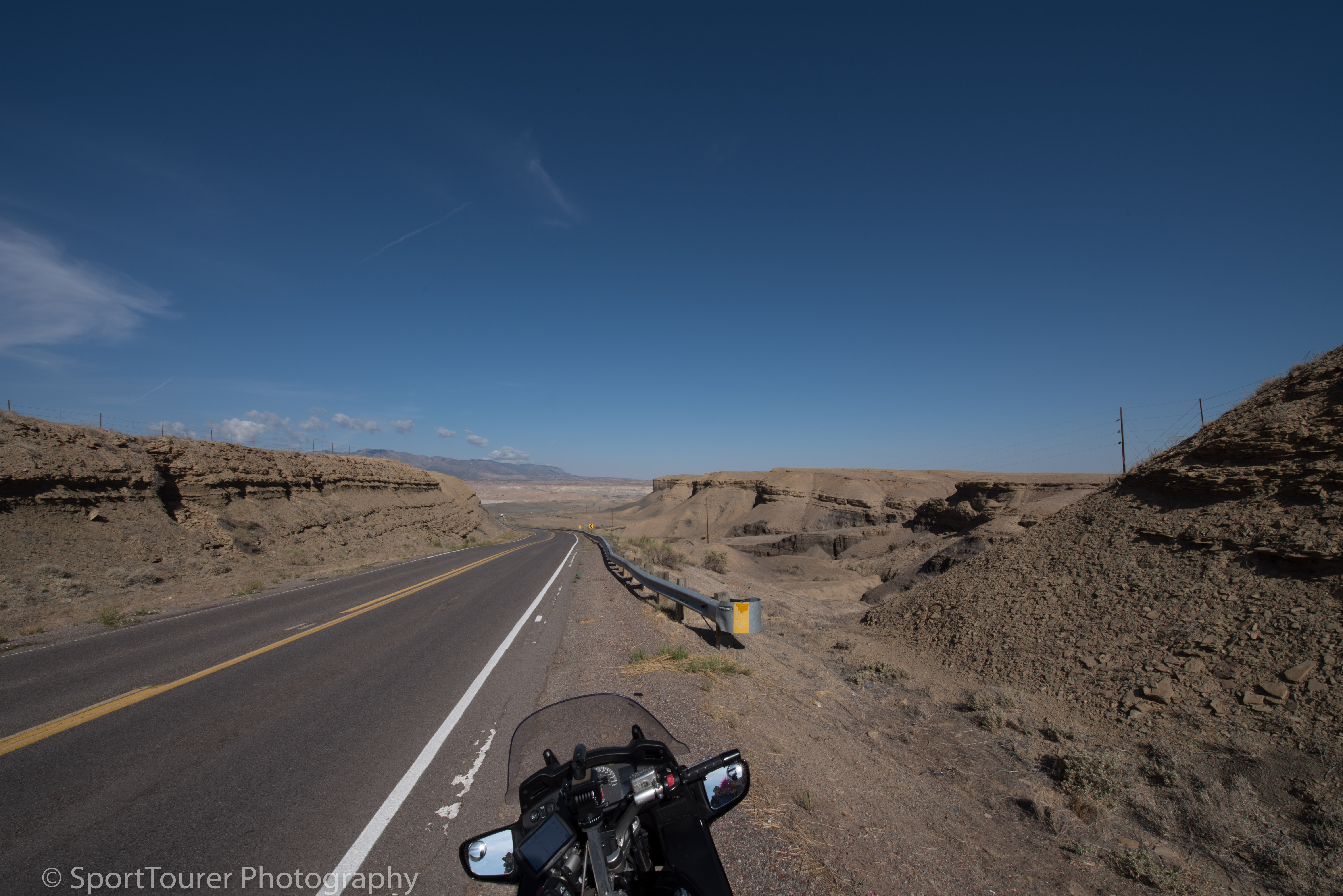  approaching Beclabito, NM en route to the 4 Corners Monument. Great scenery, great riding and great heat! 