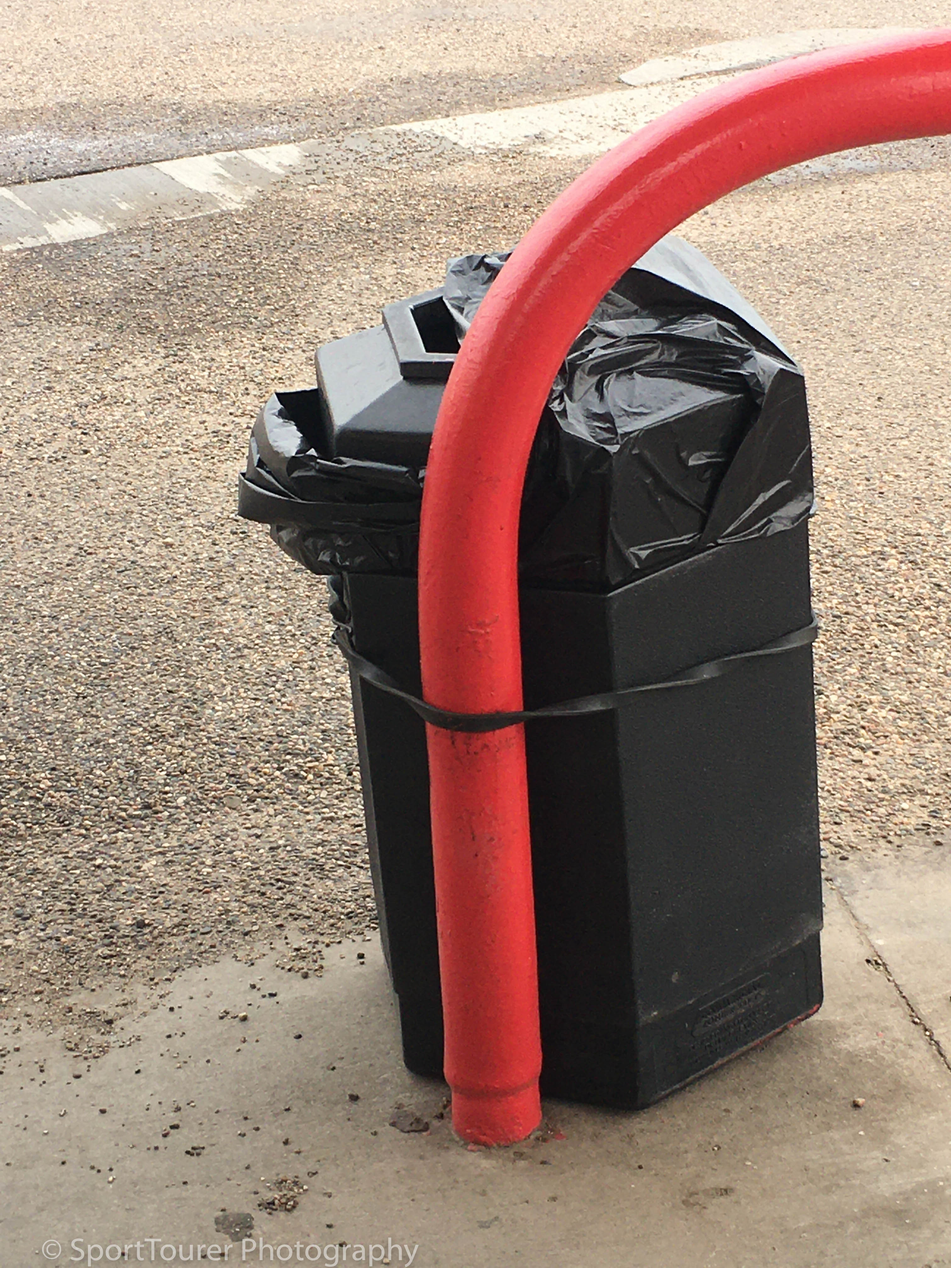  Trashcan secured in the strong winds of the South Dakota Plains 