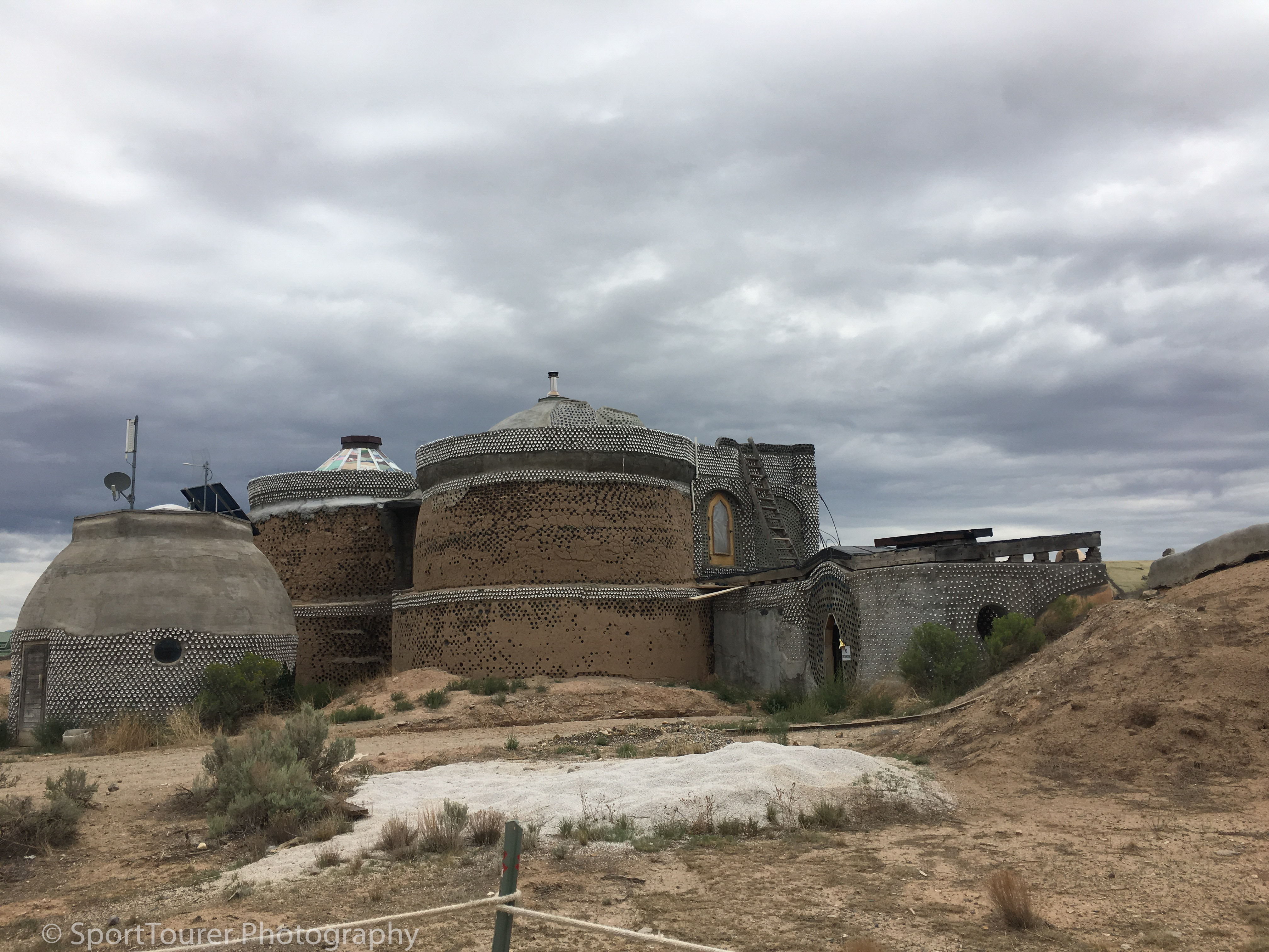  Admiring one of the buildings at the Earthlink compund. Appropriate Technology. Commanded my respect! 